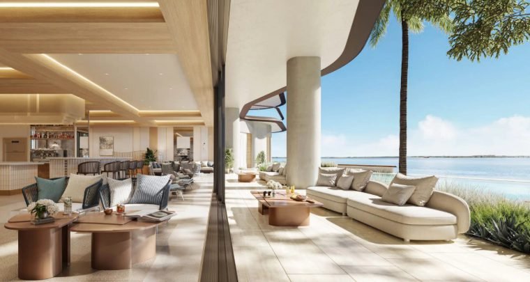 Lounge e café da piscina com vista para a baía