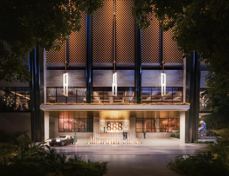 Entrada do 888 Brickell com porte-cochère e fachada iluminada