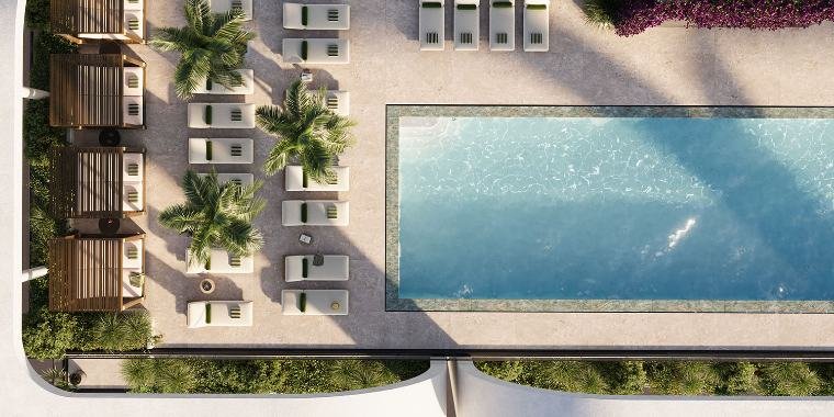 Piscina no pátio com paisagismo e espreguiçadeiras