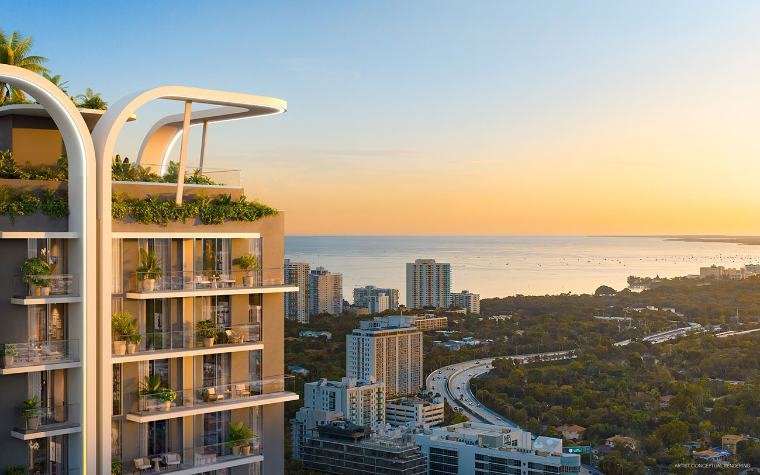 Torre com terraços e vista para a baía ao entardecer