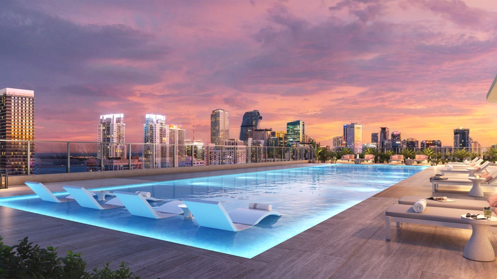 Rooftop com piscina ao entardecer no 600 Miami Worldcenter