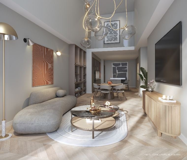 Sala de estar totalmente mobiliada de um townhome do One W12