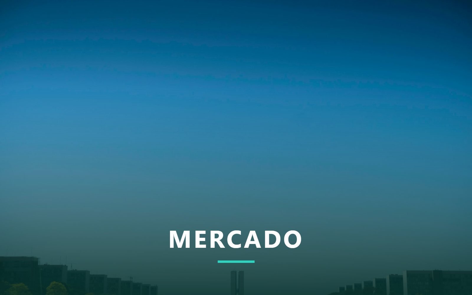 Vista de prédios residenciais e torres comerciais ao entardecer